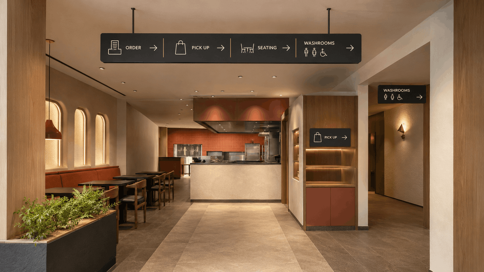 Illuminated QSR menu board showing order, payment, and pick-up sections with food imagery and an order-number display